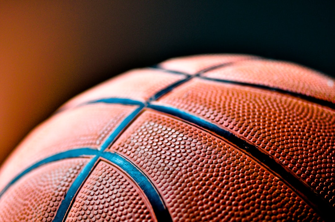 brown-and-black-basketball-ball-bfablvcbti8